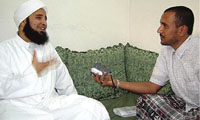 Habib Ali Zain al-Abideen al-Jifri with Yemen Times repoter.