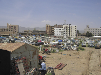 Hajajs` clothes are hung on swings while their families swing and sing in their absence.	photo by Arwa Othman