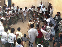 While the groom, prepares for Al-Saherh Al-Henna
