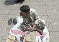 Waiting for a customer. Street children are subjected to skin diseases, respiratory diseases and venereal or sexual diseases.