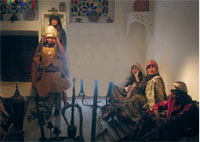 After the procession, the bride sits among her guests, wearing a special dress that fits the days events. YTPHOTO BY SADDAM AL-ASHMOURI