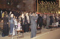The attendees as well as Palestinian children swear not to forfeit even single sand of the holy land.