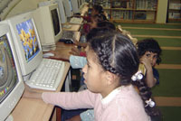 Most girls at the orphanage have special courses in computers either to practice their schoolwork or enjoy their free time. However, Hanouf wanted to have her photo taken while her computer came on.