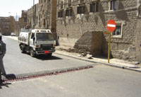 Drivers complain about unseen signs and new types of barriers. Speed bumps placed next to iron tire deflator strips cause additional damages. 	Photos by Nasri Al-Saqqaf