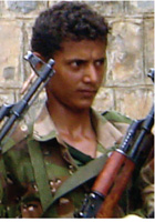 This 15-year-old soldier is suspicious of journalists, having learnt to live with fear of Guerrilla attacks.