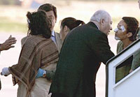 Spanish foreign minister congratulates one of the Spanish tourists on her survival.