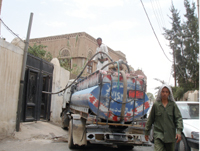 Rapidly depleting water resources have forced residents of Sanaa to buy water from private sources. Water levels are dropping by six metres a year in the Yemeni capital.         David Swanson/IRIN
