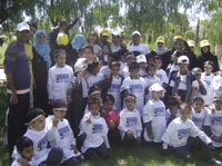 Children with  their teachers and Elizabeth White, director of the British Council in Yemen and Khadija Al-Surhi, director of Dreams + Teams in Yemen and deputy director of the British Council.