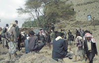 Angry citizens surrounding the military car which they abducted in retaliation of the security harassment.