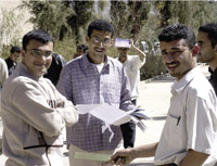 A group of students discussing their exam questions.YT PHOTO