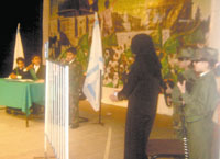 Children depicting a scene from the trial of Ahlam Al-Tamimi where she was sentenced to 16 life imprisonment terms, throughout the ordeal she never stopped smiling.