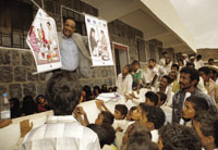 Children captivated by the health care personnel in one of the community health education sessions. (MDM Photo by Jean Baptiste Lopez)