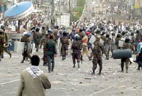 Eyewitnesses said that chaos started when policemen and some protestors fired at the air. Photo by Mohamed Al-Qadhi