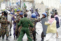 Eyewitnesses said that some policemen used brutal force to stop the protestors from advancing. Photo by Mohamed Al-Qadhi