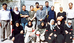 Basketball teams with the Principal and Vice Principal of the school