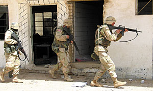 U.S. soldiers from 2nd Battalion, 70 Armor, conduct a search of a military complex in the town of Kerbala, southwest of Baghdad, April 5. REUTERS