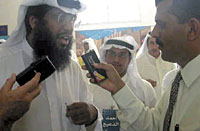 Al-Zaidi interviewing Ahmed Al-Duaij, an Islamic candidate