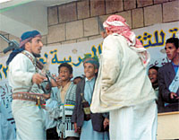 Tribesmen turning over their light weapons to SOHP. This is the first time real disarmament has been reported.