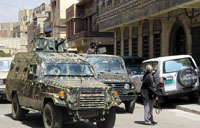 Armored vehicles and heavy security around the court where the sentence was made.<br>YT photos by M. Al-Qadhi’/><figcaption>Armored vehicles and heavy security around the court where the sentence was made.<br>YT photos by M. Al-Qadhi</figcaption></figure></div></td></tr></table><b><i>Mohammed Al-Qadhi</i></b><br>On Saturday, the Sana'a Criminal Court concerned with terrorism, sentenced one al-Qaeda militant to death, while 14 others received prison terms of between 3 to 10 years, having been found guilty of forming an armed group and carrying out attacks on Yemeni and Western targets.  The court run by Judge Ahmad al-Jermozi sentenced Hizam Mujali to death for killing a security man named Hamid Khasroof at a security checkpoint. <br>Five other al-Qaeda supporters, namely They were: Omar Saeed Hasan Jarallah, Fawzi al-Wajeeh, Mohammed Saeed Ali al-Amari, Fawzi Yahia al-Hababi, and Yasser Ali Salem (tried in absentia), received sentences of 10 years for bombing the French supertanker Limburg.<br>The judge, while reading the verdict, said these defendants were found guilty of participating in the October 2002 bombing of the Limburg oil tanker, which killed a Bulgarian crew member and spilled 90,000 barrels of oil into the port of Mukala.<br>The two brothers Fawaz al-Rabee and Abu Bakr al-Rabee were sentenced to 10 years in jail. The conviction of Fawaz al-Rabeiee, the ring leader, included the attack on the helicopter of the US Hunt Oil company, and the detonation of explosions at a building of the civil aviation authority. Al-Rabee also was fined $100,000 to compensate the civil aviation authority for damage to the building. He also participated in the murder of Khasroof.<br>The other five militants (Ibraheem Mohammed al-Huwaidi, Aref Saleh Ali Mujali, Mohammed Abdullah al-Dailami, Abdulghani Ali Hussein Kaifan, and Kasem Yahia al-Raimee) were sentenced to five years in prison. They were found guilty of plotting attacks against the US, French, UK, Cuban and German embassies, and plotting to assassinate former U.S. Ambassador to Yemen, Edmund Hull, as well as intelligence officials.<br>The two defendants- Khaled Ahmad al-Jalob, and Saleem Mohammed Ali al-Dailami, were sentenced to three years in prison, for falsifying documents relating to the various attacks.<br>The verdicts included that the explosives (approximately half a ton) and weapons seized with the defendants, be confiscated. <br>The defendants strongly condemned and rejected the verdict, doubting the legitimacy of the court. Upon hearing the verdict, the 13 bearded men in blue prison dress, burst into cries of “God is great, America is the enemy of God, Osama bin Laden is God's beloved” from behind the bar. The defendant Yasser Ali Salem was tried in absentia, while Saleem Mohammed Ali al-Dailami was absent from the pronouncement of the verdict due to his sickness. All the defendants and their relatives appealed the verdicts.<br>The judge said while reading the verdict, that Abdulraheem al-Nashiri, first prime suspect of the USS Cole bombing (currently in the US custody), paid $40,000 to fund the Limburg attack. The explosives were bought by the former al-Qaeda leader Abu Ali al-Harithi and were transported from his house in Shabwa to Mukalla in Hadramut. Al-Harithi was killed by the CIA with a missile fired from a drone aircraft later in 2002.<br>Relatives of the defendants who were present in the courtroom condemned the verdicts, describing them as political. The courtroom saw hustle and bustle as the crowd of the defendants' relatives gathered around the bar, furiously criticizing the court. Father of defendant Abdulkareem Kaifan told Yemen Times “the verdict was already decided and the tribunal was just a decoration to pass the verdict.” While Saleh Mujali, father of Hizam who received death penalty, said, “The verdict is unjust and the agents are behind it.” The father of Fawaz al-Rabee said that there is no legal basis for the verdict as the defendants did not get enough legal protection. Advocate Faiz al-Hajori who was defending al-Wajeeh said, “the court did not pay attention to the defense we presented. The verdicts were based on evidences which were proved false.”<br>However, other observers had expected heavier verdicts for some defendants like Fawaz al-Rabee, a former employee at the Presidential office, and an al-Qaeda suspect wanted by the US government. However, they said that the process of the tribunal was full of mistakes and lapses, as the 12 suspects were left without defense. Advocates named by the defendants quit the trial twice in protest against the refusal of the court to provide them with a copy of investigation documents. Even the advocates appointed by the court did the same, for the same reason, leaving the defendants without a defense, which has shed doubts over the legitimacy of the tribunal despite the fact that some defendants admitted their guilt in the first hearing held on May 29th.<br>The verdict was issued amid the heavy security measures of the final session.<br />——<br />[archive-e:768-v:13-y:2004-d:2004-08-30-p:front]							</div>
													<div class="similar-articles-block">
		<div class="articles-title-block">
			<h5 class="articles-block-title">SIMILAR ARTICLES</h5>
		</div>
		<div class="similar-articles-block-colls coll-2">
							<div>
					<article>
	<a class="article-card" href="https://yementimes.com/heavy-rains-and-earthquakes-displace-people-in-ibb-archives2010-1407-front/">
					<div class="article-card-img">
									<img width="400" height="261" src="https://yementimes.com/wp-content/uploads/2010/10/local1407main_1.jpg" class="attachment-post-thumbnail size-post-thumbnail wp-post-image" alt="" decoding="async" loading="lazy" srcset="https://yementimes.com/wp-content/uploads/2010/10/local1407main_1.jpg 400w, https://yementimes.com/wp-content/uploads/2010/10/local1407main_1-300x196.jpg 300w" sizes="auto, (max-width: 400px) 100vw, 400px" />															</div>
				<div class="article-card-caption">
			<h4 class="article-card-title">Heavy rains and earthquakes displace people in Ibb [Archives:2010/1407/Front]</h4>
			<p>By Ali Saeed IBB, Oct. 11 – Mohammad Nu’man, 27, in Al-Makhadr district, Ibb, and…</p>
			<div class="article-card-caption-bottom">
				<div class="article-card-author">archive</div>
				<div class="article-card-date">October 14 2010</div>
			</div>
		</div>
	</a>
</article>				</div>
							<div>
					<article>
	<a class="article-card" href="https://yementimes.com/education-key-to-maternal-and-newborn-health-archives2009-1228-front-page/">
					<div class="article-card-img">
									<img width="137" height="200" src="https://yementimes.com/wp-content/uploads/2009/01/front1_1-4.jpg" class="attachment-post-thumbnail size-post-thumbnail wp-post-image" alt="" decoding="async" loading="lazy" />															</div>
				<div class="article-card-caption">
			<h4 class="article-card-title">Education key to maternal and newborn health [Archives:2009/1228/Front Page]</h4>
			<p>Salma IsmailSANA'A Jan. 25 ) Childbirth and pregnancy are generally considered times of great joy,…</p>
			<div class="article-card-caption-bottom">
				<div class="article-card-author">archive</div>
				<div class="article-card-date">January 26 2009</div>
			</div>
		</div>
	</a>
</article>				</div>
					</div>
	</div>
					</div>
					<div class="sidebar-right">
	<div class="widget widget-subscribe-form">
	<div class="articles-title-block">
		<h5 class="articles-block-title">SUBSCRIBE NOW</h5>
	</div>
	<form class="subscribe-form" method="post" action="/?na=s">
		<div class="form-group">
			<input type="hidden" name="nlang" value="">
			<input class="form-control" type="email" name="ne" placeholder="Enter your email" value="" required>
			<button type="submit" class="btn"><span>SUBSCRIBE</span></button>
		</div>
	</form>
</div><input type="hidden" name="nlang" value="">
						<div class="widget">
			<div class="articles-title-block">
				<h5 class="articles-block-title">CATEGORIES</h5>
			</div>
			<div>
				<nav>
					<ul class="navbar-collapse-mnu">
													<li><a href="https://yementimes.com/category/view/">Viewpoint</a></li>
													<li><a href="https://yementimes.com/category/letters/">Letters to the Editor</a></li>
													<li><a href="https://yementimes.com/category/uncategorised/">Uncategorised</a></li>
													<li><a href="https://yementimes.com/category/law-diplomacy/">Law & Diplomacy</a></li>
													<li><a href="https://yementimes.com/category/cartoon/">Cartoon</a></li>
													<li><a href="https://yementimes.com/category/reportage/">Reportage</a></li>
													<li><a href="https://yementimes.com/category/health/">Health & Environment</a></li>
													<li><a href="https://yementimes.com/category/governance/">Governance</a></li>
													<li><a href="https://yementimes.com/category/economy/">Business & Economy</a></li>
													<li><a href="https://yementimes.com/category/science-technology/">Science & Technology</a></li>
													<li><a href="https://yementimes.com/category/culture/">Culture & Society</a></li>
													<li><a href="https://yementimes.com/category/education/">Education</a></li>
													<li><a href="https://yementimes.com/category/opinion/">Opinion</a></li>
													<li><a href="https://yementimes.com/category/archived-pdf/">Archived PDF</a></li>
													<li><a href="https://yementimes.com/category/interview/">Interview</a></li>
													<li><a href="https://yementimes.com/category/featured/">Featured</a></li>
													<li><a href="https://yementimes.com/category/community/">Community</a></li>
													<li><a href="https://yementimes.com/category/front-featured/">Front Featured</a></li>
													<li><a href="https://yementimes.com/category/front/">Front Page</a></li>
													<li><a href="https://yementimes.com/category/ln-featured/">Local News Featured</a></li>
													<li><a href="https://yementimes.com/category/focus/">Focus</a></li>
													<li><a href="https://yementimes.com/category/economy-featured/">Business & Economy Featured</a></li>
													<li><a href="https://yementimes.com/category/lastpage/">Last Page</a></li>
													<li><a href="https://yementimes.com/category/culture-featured/">Culture & Society Featured</a></li>
													<li><a href="https://yementimes.com/category/ln/">Local News</a></li>
													<li><a href="https://yementimes.com/category/supplementary/">Supplementary</a></li>
													<li><a href="https://yementimes.com/category/press/">Press Review</a></li>
													<li><a href="https://yementimes.com/category/sports/">Sports</a></li>
											</ul>
				</nav>
			</div>
		</div>
				<div class="widget">
			<div class="articles-title-block">
				<h5 class="articles-block-title">SHARE THIS ARTICLE ON</h5>
				<div><div class="addtoany_shortcode"><div class="a2a_kit a2a_kit_size_52 addtoany_list" data-a2a-url="https://yementimes.com/al-qaeda-militants-convicted-of-terrorism-archives2004-768-front-page/" data-a2a-title="Al-Qaeda militants convicted of terrorism [Archives:2004/768/Front Page]"><a class="a2a_button_twitter" href="https://www.addtoany.com/add_to/twitter?linkurl=https%3A%2F%2Fyementimes.com%2Fal-qaeda-militants-convicted-of-terrorism-archives2004-768-front-page%2F&linkname=Al-Qaeda%20militants%20convicted%20of%20terrorism%20%5BArchives%3A2004%2F768%2FFront%20Page%5D" title="Twitter" rel="nofollow noopener" target="_blank"></a><a class="a2a_button_facebook" href="https://www.addtoany.com/add_to/facebook?linkurl=https%3A%2F%2Fyementimes.com%2Fal-qaeda-militants-convicted-of-terrorism-archives2004-768-front-page%2F&linkname=Al-Qaeda%20militants%20convicted%20of%20terrorism%20%5BArchives%3A2004%2F768%2FFront%20Page%5D" title="Facebook" rel="nofollow noopener" target="_blank"></a><a class="a2a_button_linkedin" href="https://www.addtoany.com/add_to/linkedin?linkurl=https%3A%2F%2Fyementimes.com%2Fal-qaeda-militants-convicted-of-terrorism-archives2004-768-front-page%2F&linkname=Al-Qaeda%20militants%20convicted%20of%20terrorism%20%5BArchives%3A2004%2F768%2FFront%20Page%5D" title="LinkedIn" rel="nofollow noopener" target="_blank"></a></div></div></div>
			</div>
		</div>
	</div>
				</div>				
			</div>
		</section>
	</main>
<footer class="main-foot">
	<div class="container">
		<div class="navbar-foot">
							<div class="navbar-foot-logo-block">
					<div class="navbar-foot-logo">
						<a href="https://yementimes.com">
							<img src="https://yementimes.com/wp-content/uploads/2023/02/yemens.png" alt="yemens">
						</a>
					</div>
				</div>
						<div class="foot-menu-wrap coll-4">
				<div>
											<div class="foot-title">Footer</div>
						<nav>
							<ul id="menu-footer" class="foot-menu coll-2"><li id="menu-item-103253" class="menu-item menu-item-type-post_type menu-item-object-page menu-item-103253"><a href="https://yementimes.com/contact/">Contact Us</a></li>
<li id="menu-item-103254" class="menu-item menu-item-type-post_type menu-item-object-page menu-item-103254"><a href="https://yementimes.com/about/">About Us</a></li>
</ul>						</nav>
									</div>
				<div>
											<div class="foot-title">Quicklinks</div>
						<nav>
							<ul id="menu-quicklinks" class="foot-menu"><li id="menu-item-273" class="menu-item menu-item-type-post_type menu-item-object-page menu-item-273"><a href="https://yementimes.com/archive/">Archive</a></li>
</ul>						</nav>
									</div>
				<div>
											<div class="foot-title">Follow Us</div>
																<nav>
							<ul class="social-menu">
																	<li><a href="https://twitter.com/theyementimes" target="_blank"><?xml version="1.0" encoding="UTF-8"?> <svg xmlns="http://www.w3.org/2000/svg" width="22.235" height="27.376" viewBox="0 0 22.235 27.376"><path d="M24.562,8.922c.017.243.017.486.017.73A15.854,15.854,0,0,1,8.616,25.615,15.856,15.856,0,0,1,0,23.1a11.607,11.607,0,0,0,1.355.069,11.237,11.237,0,0,0,6.966-2.4,5.621,5.621,0,0,1-5.246-3.891,7.076,7.076,0,0,0,1.06.087,5.934,5.934,0,0,0,1.477-.191,5.612,5.612,0,0,1-4.5-5.507V11.2a5.651,5.651,0,0,0,2.536.712,5.619,5.619,0,0,1-1.737-7.5A15.948,15.948,0,0,0,13.48,10.277a6.334,6.334,0,0,1-.139-1.285,5.616,5.616,0,0,1,9.71-3.839A11.047,11.047,0,0,0,26.612,3.8,5.6,5.6,0,0,1,24.145,6.89a11.248,11.248,0,0,0,3.231-.869,12.061,12.061,0,0,1-2.814,2.9Z" transform="translate(25.615) rotate(90)" fill="currentColor"></path></svg> </a></li>
																	<li><a href="https://www.linkedin.com/company/yementimes" target="_blank"><?xml version="1.0" encoding="UTF-8"?> <svg xmlns="http://www.w3.org/2000/svg" width="24.325" height="24.325" viewBox="0 0 24.325 24.325"><path d="M5.445,24.326H.4V8.085H5.445ZM2.921,5.87A2.935,2.935,0,1,1,5.841,2.921,2.945,2.945,0,0,1,2.921,5.87Zm21.4,18.456H19.288V16.42c0-1.884-.038-4.3-2.622-4.3-2.622,0-3.024,2.047-3.024,4.165v8.041H8.6V8.085h4.837V10.3h.071a5.3,5.3,0,0,1,4.772-2.623c5.1,0,6.042,3.361,6.042,7.727v8.921Z" transform="translate(24.326) rotate(90)" fill="currentColor"></path></svg> </a></li>
															</ul>
						</nav>
									</div>
				<div class="foot-subscribe-block">
	<div class="foot-subscribe">
		<div class="foot-title">Subscribe Now</div>
		<form class="subscribe-form" method="post" action="/?na=s">
			<div class="form-group">
				<input type="hidden" name="nlang" value="">
				<input class="form-control white" type="email" name="ne" placeholder="Enter your email" value="" required>
				<button type="submit" class="btn btn-simple btn-red"><span>SUBSCRIBE</span><div class="arrow"></div></button>
			</div>
		</form>
	</div>
</div><input type="hidden" name="nlang" value="">
			</div>
							<div class="foot-bottom-line">
											<div><p>© 2026 The Yemen Times. All rights reserved.</p></div>
																<nav>
													</nav>
									            
						
				</div>
					</div>
	</div>
</footer>
<script type="speculationrules">
{"prefetch":[{"source":"document","where":{"and":[{"href_matches":"/*"},{"not":{"href_matches":["/wp-*.php","/wp-admin/*","/wp-content/uploads/*","/wp-content/*","/wp-content/plugins/*","/wp-content/themes/yementimes/*","/*\\?(.+)"]}},{"not":{"selector_matches":"a[rel~=\"nofollow\"]"}},{"not":{"selector_matches":".no-prefetch, .no-prefetch a"}}]},"eagerness":"conservative"}]}
</script>
<script id="ckyBannerTemplate" type="text/template"><div class="cky-overlay cky-hide"></div><div class="cky-btn-revisit-wrapper cky-revisit-hide" data-cky-tag="revisit-consent" data-tooltip="Cookie Settings" style="background-color:#CF2E34"> <button class="cky-btn-revisit" aria-label="Cookie Settings"> <img src="https://yementimes.com/wp-content/plugins/cookie-law-info/lite/frontend/images/revisit.svg" alt="Revisit consent button"> </button></div><div class="cky-consent-container cky-hide" tabindex="0"> <div class="cky-consent-bar" data-cky-tag="notice" style="background-color:#FFFFFF;border-color:#f4f4f4">  <div class="cky-notice"> <p class="cky-title" role="heading" aria-level="1" data-cky-tag="title" style="color:#212121">We value your privacy</p><div class="cky-notice-group"> <div class="cky-notice-des" data-cky-tag="description" style="color:#212121"> <p>We use cookies to enhance your browsing experience, serve personalized ads or content, and analyze our traffic. By clicking "Accept All", you consent to our use of cookies.</p> </div><div class="cky-notice-btn-wrapper" data-cky-tag="notice-buttons"> <button class="cky-btn cky-btn-customize" aria-label="Customize" data-cky-tag="settings-button" style="color:#CF2E34;background-color:transparent;border-color:#CF2E34">Customize</button> <button class="cky-btn cky-btn-reject" aria-label="Reject All" data-cky-tag="reject-button" style="color:#CF2E34;background-color:transparent;border-color:#CF2E34">Reject All</button> <button class="cky-btn cky-btn-accept" aria-label="Accept All" data-cky-tag="accept-button" style="color:#FFFFFF;background-color:#CF2E34;border-color:#CF2E34">Accept All</button>  </div></div></div></div></div><div class="cky-modal" tabindex="0"> <div class="cky-preference-center" data-cky-tag="detail" style="color:#212121;background-color:#FFFFFF;border-color:#f4f4f4"> <div class="cky-preference-header"> <span class="cky-preference-title" role="heading" aria-level="1" data-cky-tag="detail-title" style="color:#212121">Customize Consent Preferences</span> <button class="cky-btn-close" aria-label="Close" data-cky-tag="detail-close"> <img src="https://yementimes.com/wp-content/plugins/cookie-law-info/lite/frontend/images/close.svg" alt="Close"> </button> </div><div class="cky-preference-body-wrapper"> <div class="cky-preference-content-wrapper" data-cky-tag="detail-description" style="color:#212121"> <p>We use cookies to help you navigate efficiently and perform certain functions. You will find detailed information about all cookies under each consent category below.</p><p>The cookies that are categorized as "Necessary" are stored on your browser as they are essential for enabling the basic functionalities of the site. </p><p>We also use third-party cookies that help us analyze how you use this website, store your preferences, and provide the content and advertisements that are relevant to you. These cookies will only be stored in your browser with your prior consent.</p><p>You can choose to enable or disable some or all of these cookies but disabling some of them may affect your browsing experience.</p> </div><div class="cky-accordion-wrapper" data-cky-tag="detail-categories"> <div class="cky-accordion" id="ckyDetailCategorynecessary"> <div class="cky-accordion-item"> <div class="cky-accordion-chevron"><i class="cky-chevron-right"></i></div> <div class="cky-accordion-header-wrapper"> <div class="cky-accordion-header"><button class="cky-accordion-btn" aria-label="Necessary" data-cky-tag="detail-category-title" style="color:#212121">Necessary</button><span class="cky-always-active">Always Active</span> <div class="cky-switch" data-cky-tag="detail-category-toggle"><input type="checkbox" id="ckySwitchnecessary"></div> </div> <div class="cky-accordion-header-des" data-cky-tag="detail-category-description" style="color:#212121"> <p>Necessary cookies are required to enable the basic features of this site, such as providing secure log-in or adjusting your consent preferences. These cookies do not store any personally identifiable data.</p></div> </div> </div> <div class="cky-accordion-body"> <div class="cky-audit-table" data-cky-tag="audit-table" style="color:#212121;background-color:#f4f4f4;border-color:#ebebeb"><p class="cky-empty-cookies-text">No cookies to display.</p></div> </div> </div><div class="cky-accordion" id="ckyDetailCategoryfunctional"> <div class="cky-accordion-item"> <div class="cky-accordion-chevron"><i class="cky-chevron-right"></i></div> <div class="cky-accordion-header-wrapper"> <div class="cky-accordion-header"><button class="cky-accordion-btn" aria-label="Functional" data-cky-tag="detail-category-title" style="color:#212121">Functional</button><span class="cky-always-active">Always Active</span> <div class="cky-switch" data-cky-tag="detail-category-toggle"><input type="checkbox" id="ckySwitchfunctional"></div> </div> <div class="cky-accordion-header-des" data-cky-tag="detail-category-description" style="color:#212121"> <p>Functional cookies help perform certain functionalities like sharing the content of the website on social media platforms, collecting feedback, and other third-party features.</p></div> </div> </div> <div class="cky-accordion-body"> <div class="cky-audit-table" data-cky-tag="audit-table" style="color:#212121;background-color:#f4f4f4;border-color:#ebebeb"><p class="cky-empty-cookies-text">No cookies to display.</p></div> </div> </div><div class="cky-accordion" id="ckyDetailCategoryanalytics"> <div class="cky-accordion-item"> <div class="cky-accordion-chevron"><i class="cky-chevron-right"></i></div> <div class="cky-accordion-header-wrapper"> <div class="cky-accordion-header"><button class="cky-accordion-btn" aria-label="Analytics" data-cky-tag="detail-category-title" style="color:#212121">Analytics</button><span class="cky-always-active">Always Active</span> <div class="cky-switch" data-cky-tag="detail-category-toggle"><input type="checkbox" id="ckySwitchanalytics"></div> </div> <div class="cky-accordion-header-des" data-cky-tag="detail-category-description" style="color:#212121"> <p>Analytical cookies are used to understand how visitors interact with the website. These cookies help provide information on metrics such as the number of visitors, bounce rate, traffic source, etc.</p></div> </div> </div> <div class="cky-accordion-body"> <div class="cky-audit-table" data-cky-tag="audit-table" style="color:#212121;background-color:#f4f4f4;border-color:#ebebeb"><p class="cky-empty-cookies-text">No cookies to display.</p></div> </div> </div><div class="cky-accordion" id="ckyDetailCategoryperformance"> <div class="cky-accordion-item"> <div class="cky-accordion-chevron"><i class="cky-chevron-right"></i></div> <div class="cky-accordion-header-wrapper"> <div class="cky-accordion-header"><button class="cky-accordion-btn" aria-label="Performance" data-cky-tag="detail-category-title" style="color:#212121">Performance</button><span class="cky-always-active">Always Active</span> <div class="cky-switch" data-cky-tag="detail-category-toggle"><input type="checkbox" id="ckySwitchperformance"></div> </div> <div class="cky-accordion-header-des" data-cky-tag="detail-category-description" style="color:#212121"> <p>Performance cookies are used to understand and analyze the key performance indexes of the website which helps in delivering a better user experience for the visitors.</p></div> </div> </div> <div class="cky-accordion-body"> <div class="cky-audit-table" data-cky-tag="audit-table" style="color:#212121;background-color:#f4f4f4;border-color:#ebebeb"><p class="cky-empty-cookies-text">No cookies to display.</p></div> </div> </div><div class="cky-accordion" id="ckyDetailCategoryadvertisement"> <div class="cky-accordion-item"> <div class="cky-accordion-chevron"><i class="cky-chevron-right"></i></div> <div class="cky-accordion-header-wrapper"> <div class="cky-accordion-header"><button class="cky-accordion-btn" aria-label="Advertisement" data-cky-tag="detail-category-title" style="color:#212121">Advertisement</button><span class="cky-always-active">Always Active</span> <div class="cky-switch" data-cky-tag="detail-category-toggle"><input type="checkbox" id="ckySwitchadvertisement"></div> </div> <div class="cky-accordion-header-des" data-cky-tag="detail-category-description" style="color:#212121"> <p>Advertisement cookies are used to provide visitors with customized advertisements based on the pages you visited previously and to analyze the effectiveness of the ad campaigns.</p></div> </div> </div> <div class="cky-accordion-body"> <div class="cky-audit-table" data-cky-tag="audit-table" style="color:#212121;background-color:#f4f4f4;border-color:#ebebeb"><p class="cky-empty-cookies-text">No cookies to display.</p></div> </div> </div> </div></div><div class="cky-footer-wrapper"> <span class="cky-footer-shadow"></span> <div class="cky-prefrence-btn-wrapper" data-cky-tag="detail-buttons"> <button class="cky-btn cky-btn-reject" aria-label="Reject All" data-cky-tag="detail-reject-button" style="color:#CF2E34;background-color:transparent;border-color:#CF2E34"> Reject All </button> <button class="cky-btn cky-btn-preferences" aria-label="Save My Preferences" data-cky-tag="detail-save-button" style="color:#CF2E34;background-color:transparent;border-color:#CF2E34"> Save My Preferences </button> <button class="cky-btn cky-btn-accept" aria-label="Accept All" data-cky-tag="detail-accept-button" style="color:#FFFFFF;background-color:#CF2E34;border-color:#CF2E34"> Accept All </button> </div></div></div></div></script><script src="https://yementimes.com/wp-includes/js/dist/hooks.min.js?ver=dd5603f07f9220ed27f1" id="wp-hooks-js"></script>
<script src="https://yementimes.com/wp-includes/js/dist/i18n.min.js?ver=c26c3dc7bed366793375" id="wp-i18n-js"></script>
<script id="wp-i18n-js-after">
wp.i18n.setLocaleData( { 