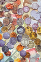 A collection of old & new Yemeni coins and banknotes