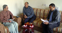 Dr. Dawood (center) in conversation with Dr. Sahu (left) and Dr. Mahmood Akhter.