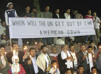 Participants from NGO lit candles in solidarity with Lebanese people.