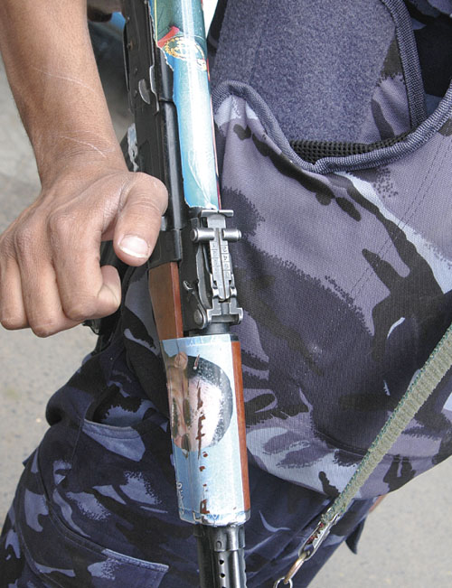One soldier puts his vote on his most valuable possession  his AK-47. Photo by Glyn Goffin
