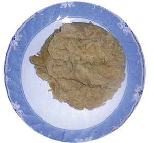 From inside the Mokhlama balls are soggy and could be enjoyed by dipping in the chutney using the spoon or by hand if you can.  	PHOTO BY HAMDAN DAMMAJ.