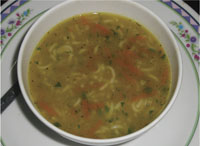 You can make the vegetable soup more colorful by adding noodles.